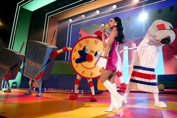 Katy Perry on stage with a giant alarm clock and walkie talkies during her PLAY Las Vegas Residency