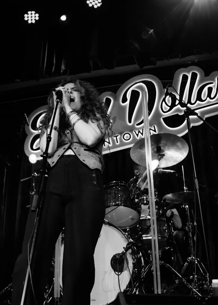 Mariah Baldwin of Mojave Sun singing on stage at The Sand Dollar | Photo: Miranda Mendelson / LiveMusicDiary.com