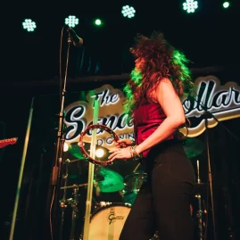 Mariah Baldwin of Mojave Sun playing tambourine | Photo: Miranda Mendelson / LiveMusicDiary.com